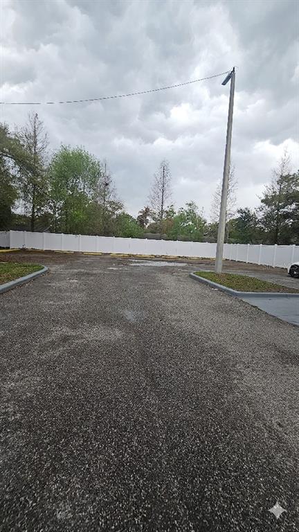 13612 North 21st Street Tampa, FL 33613 - Photo 3 of 4 a view of an outdoor space and tv