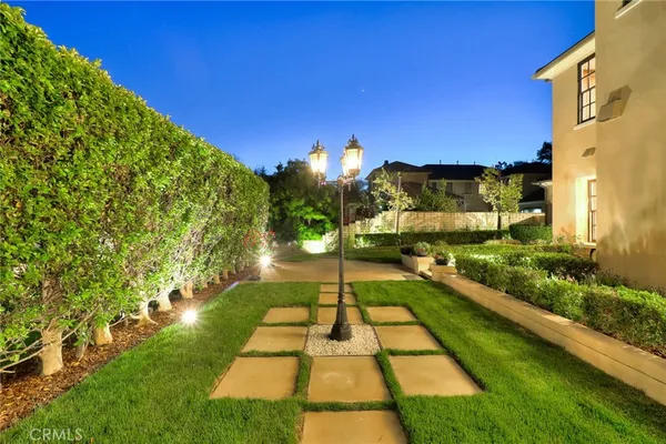 a kitchen with kitchen island a sink stove and refrigerator