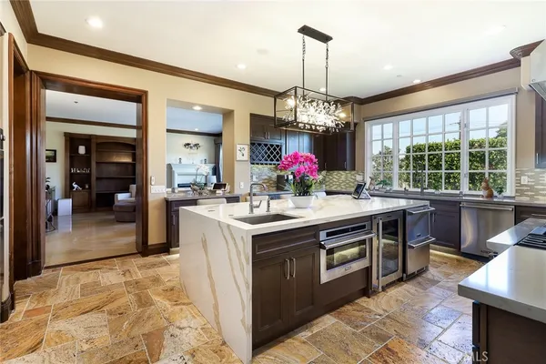 a view of a dining room with furniture and window