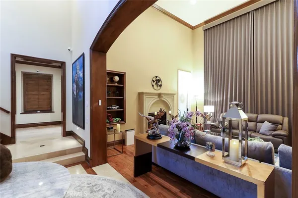 a bedroom with a bed and a fireplace