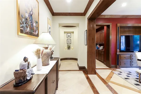 a bathroom with a white tub shower and sink