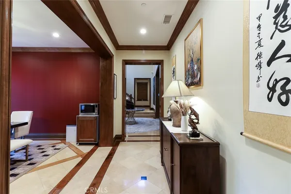 a bathroom with a sink mirror and a bathtub