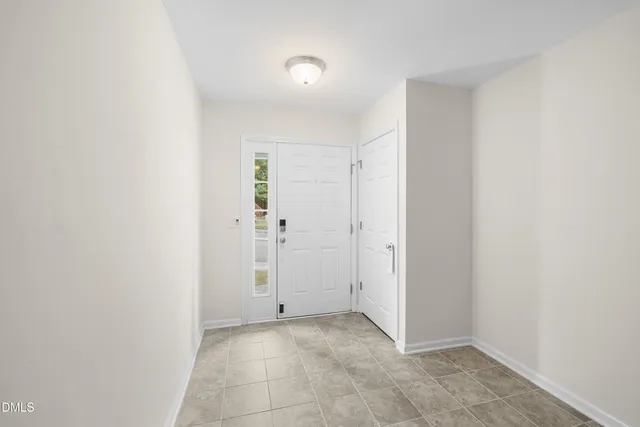 a view of entryway with stairs