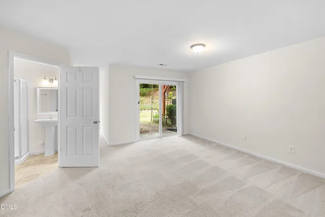 a view of a big room with furniture and a livingroom