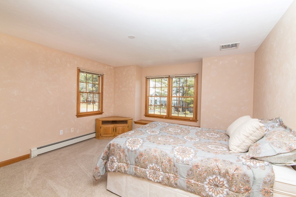 5 Parker Road Mendon, MA 01756 - Photo 13 of 28 a bedroom with a bed and a window