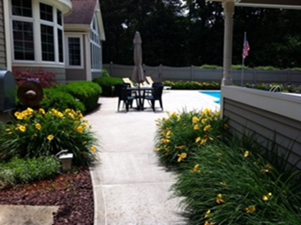5 Parker Road Mendon, MA 01756 - Photo 27 of 28 a view of a patio with table and chairs and potted plants
