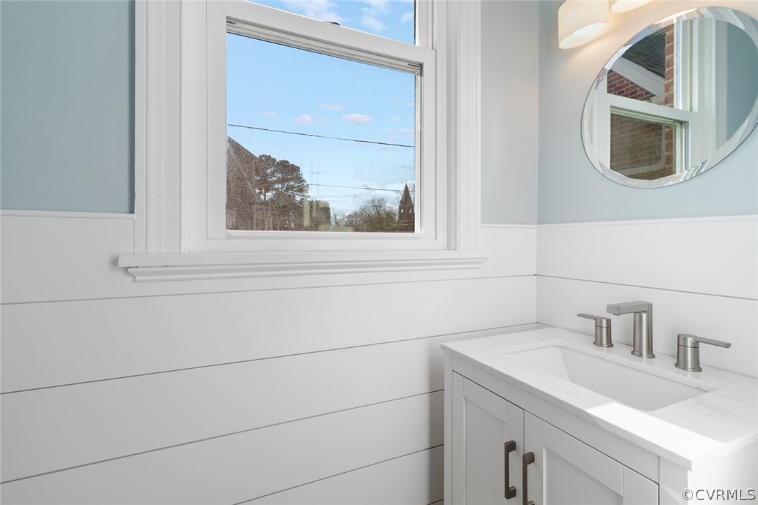 369 Main Street Reedville, VA 22539 - Photo 18 of 44 a bathroom with a sink and a mirror