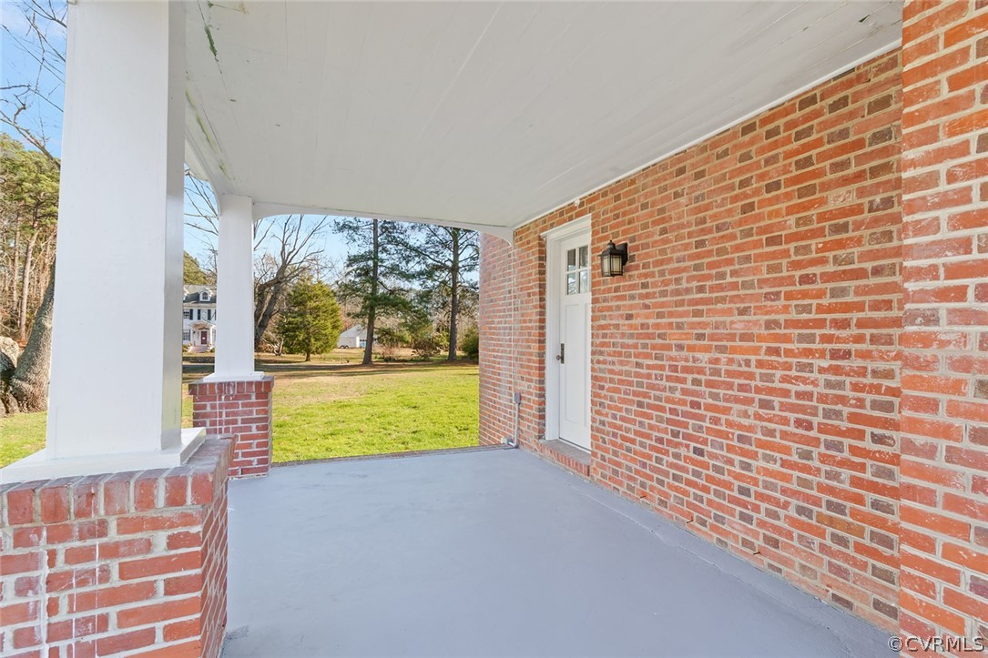 369 Main Street Reedville, VA 22539 - Photo 30 of 44 a view of door with wooden floor