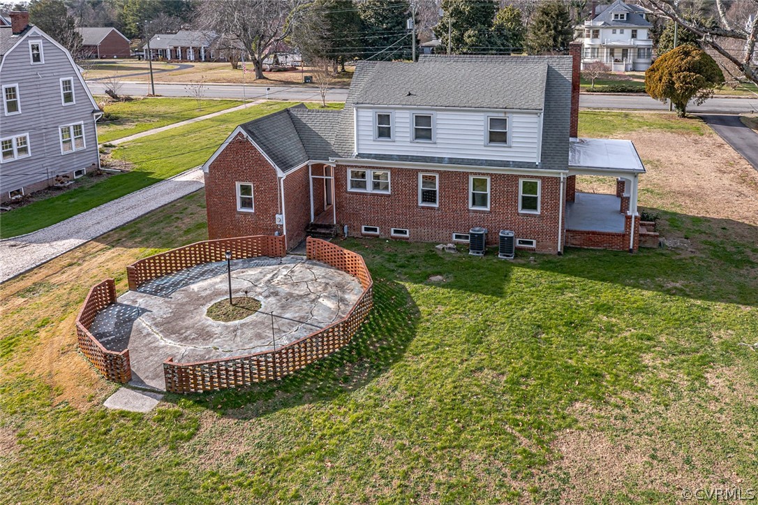 369 Main Street Reedville, VA 22539 - Photo 35 of 44 a view of a house with a swimming pool and a yard