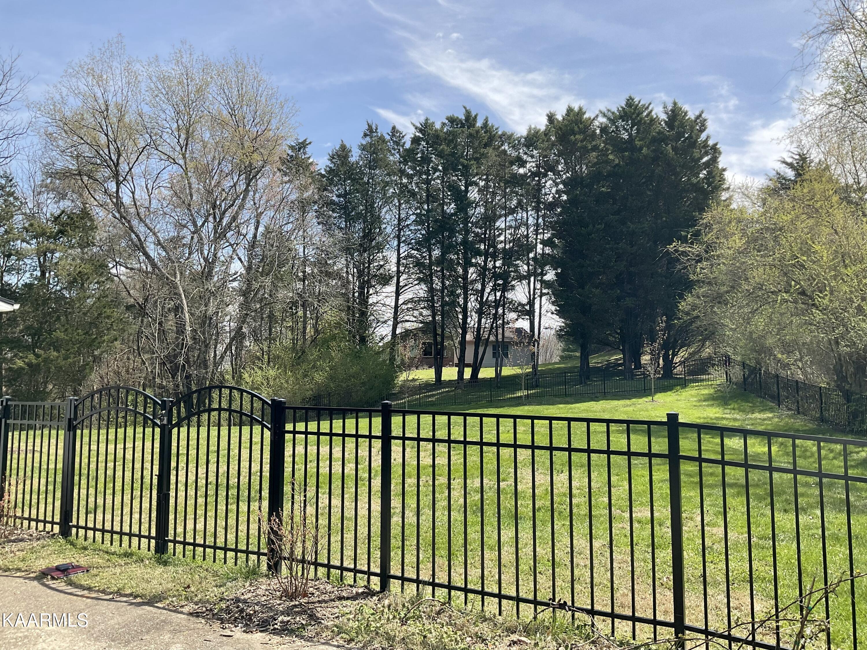 106 Targa Lane Oak Ridge, TN 37830 - Photo 32 of 37 Wrought Iron Fenced Yard
