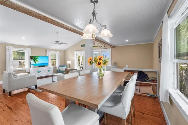 a spacious bathroom with a granite countertop sink and a mirror