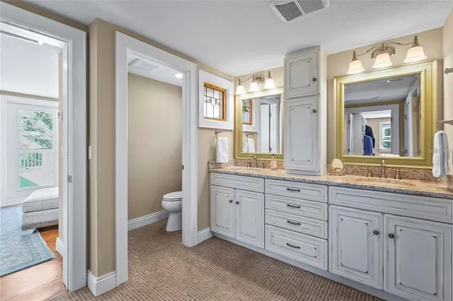 a view of a balcony with chairs