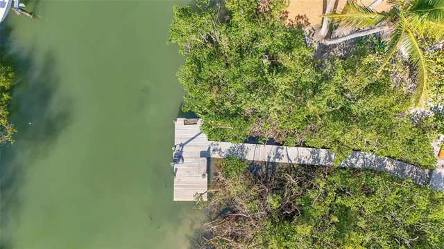 front view of a building with a garden