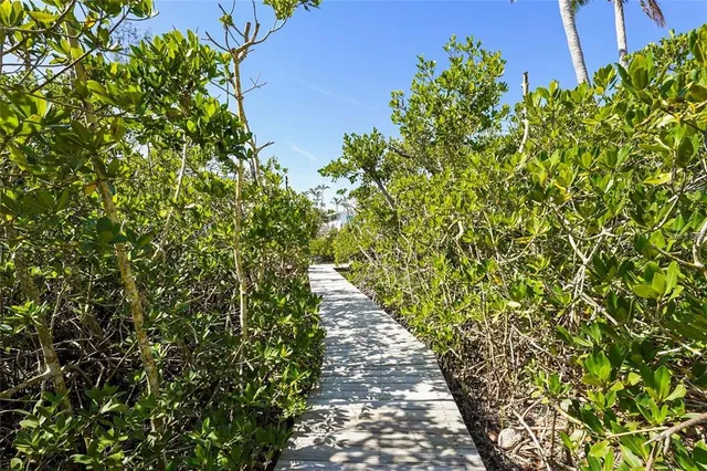 a view of balcony with wooden floor