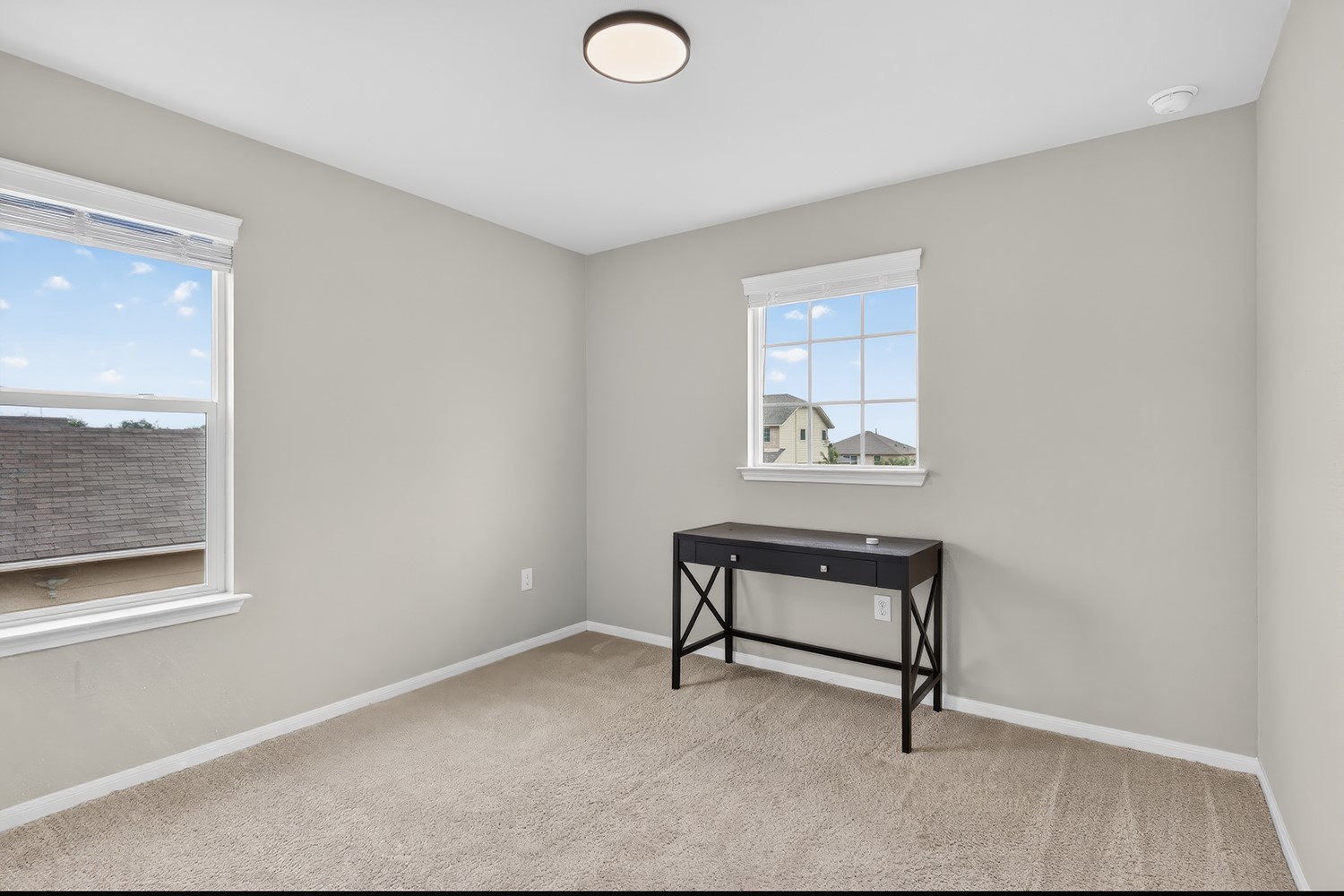 2006 Grow Lane Austin, TX 78754 - Photo 20 of 40 Two large windows illuminate this peaceful room, perfect for rest or a quiet workspace.