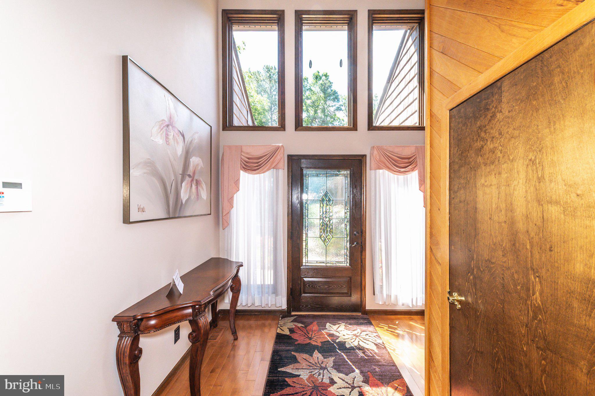 434 4th Street Atco, NJ 08004 - Photo 4 of 69 a view of a workspace with furniture and a window