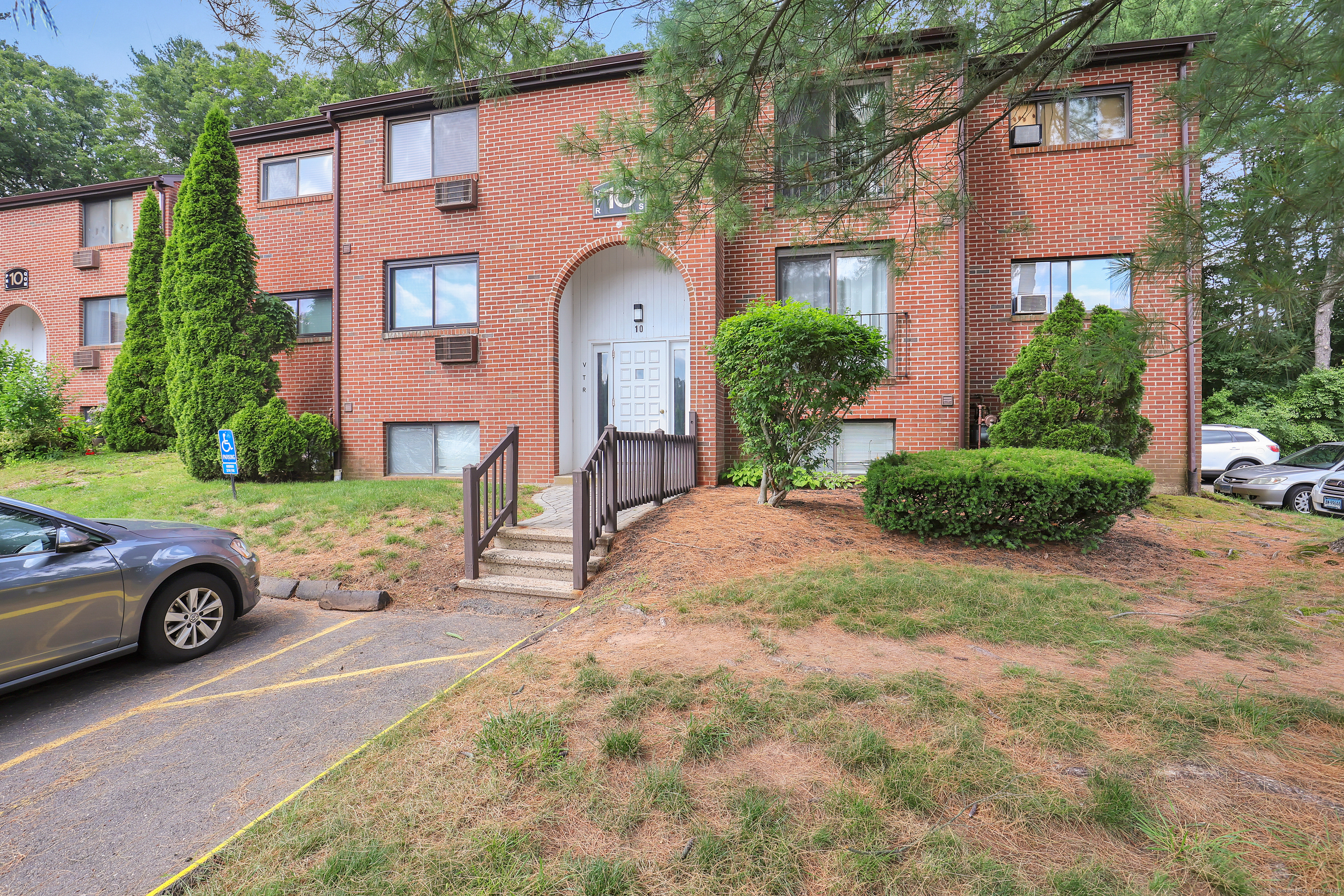 front view of a house with a yard
