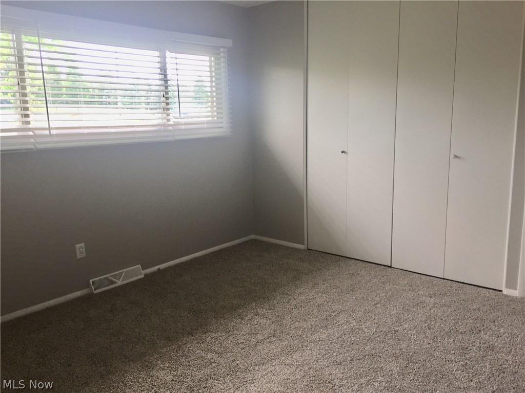 950 East Boston Road Broadview Heights, OH 44147 - Photo 23 of 30 Another view of a bedroom. There are three total each with new carpet, paint and custom blinds.