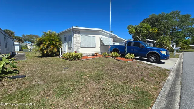 a view of a house with a garage