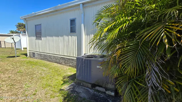 a view of a backyard with plants