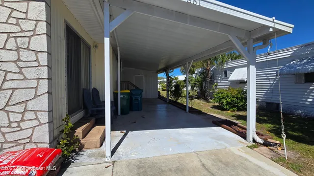 a view of balcony with patio