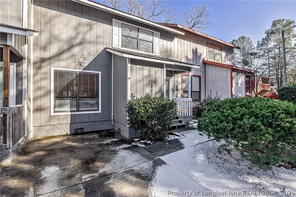 a house view with a outdoor space