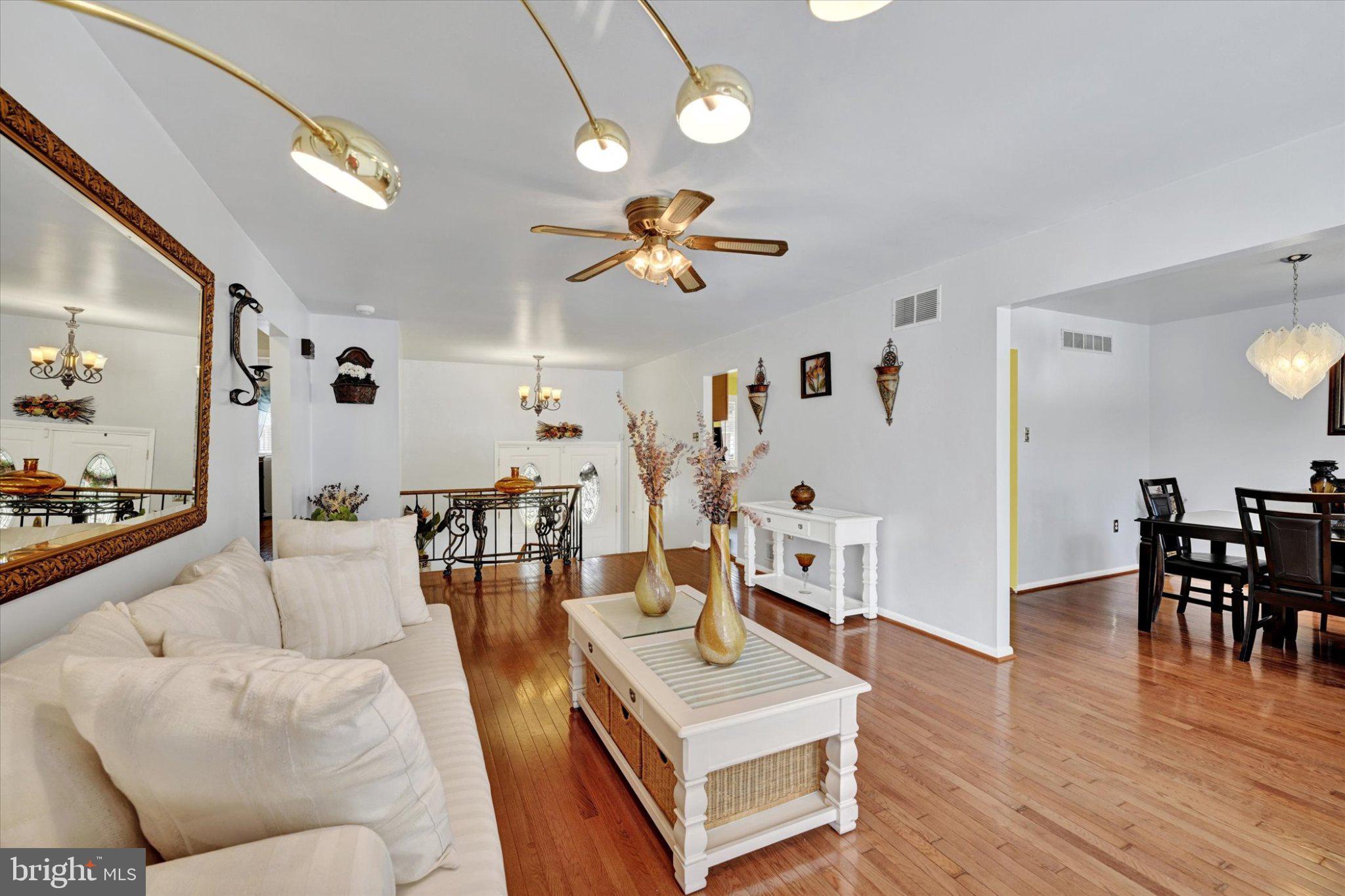 9704 Eustice Road Randallstown, MD 21133 - Photo 8 of 43 Bright and inviting open living space.