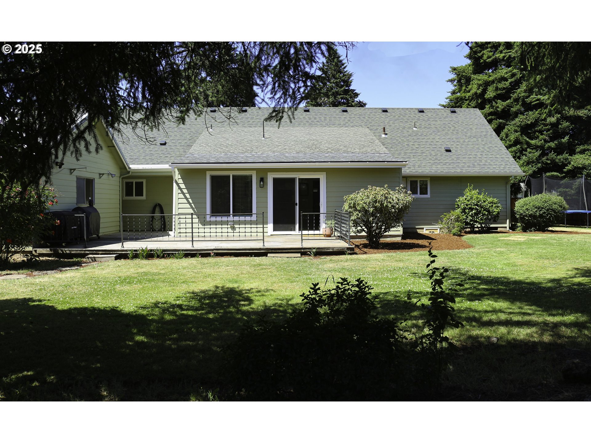 1275 Island Street Springfield, OR 97477 - Photo 1 of 36 a view of a house with a backyard