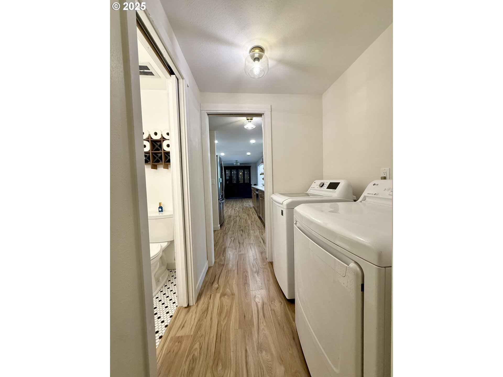 1275 Island Street Springfield, OR 97477 - Photo 16 of 36 a en suite bathroom with a sink and a mirror