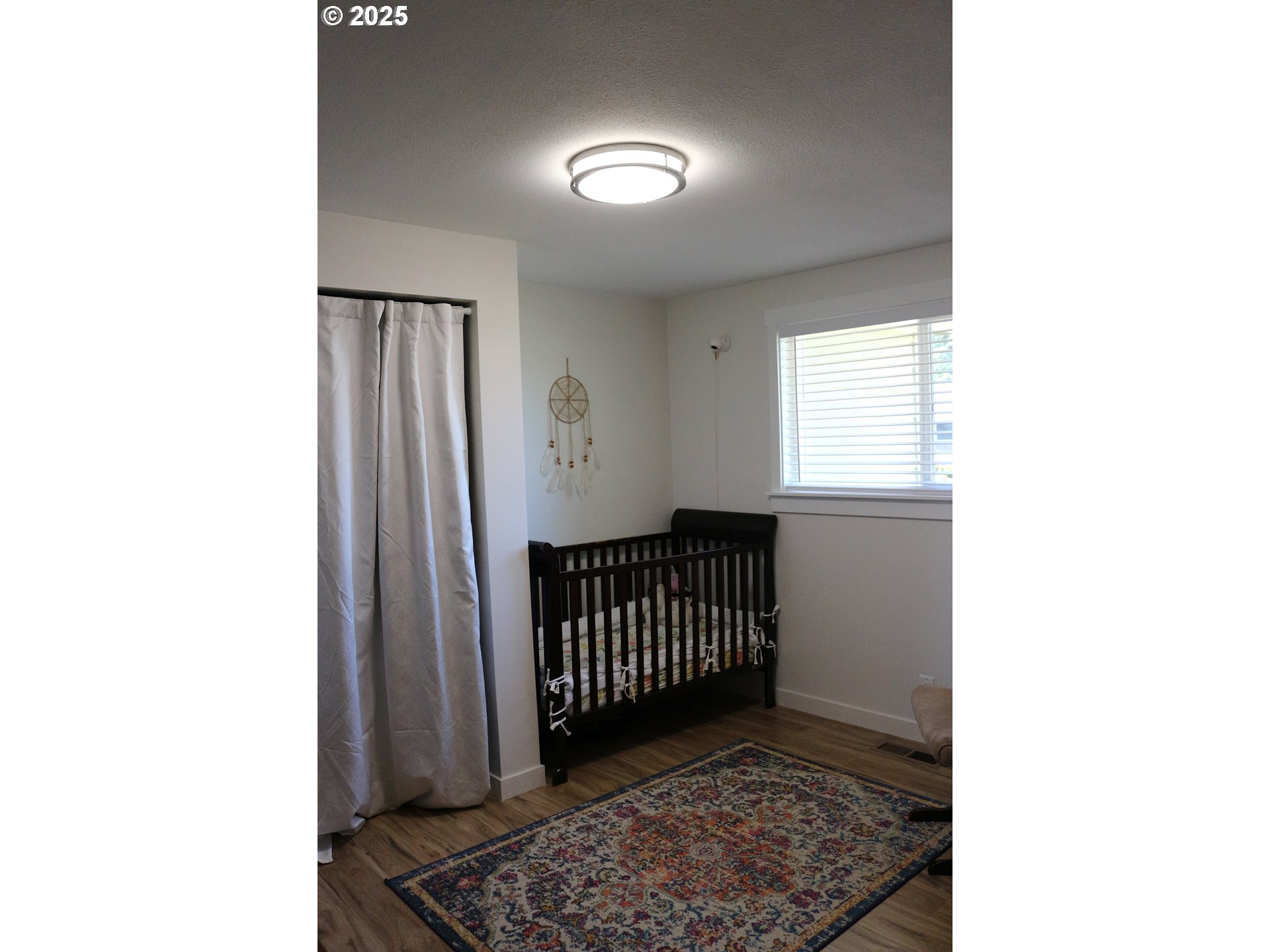 1275 Island Street Springfield, OR 97477 - Photo 25 of 36 a view of a hallway with windows