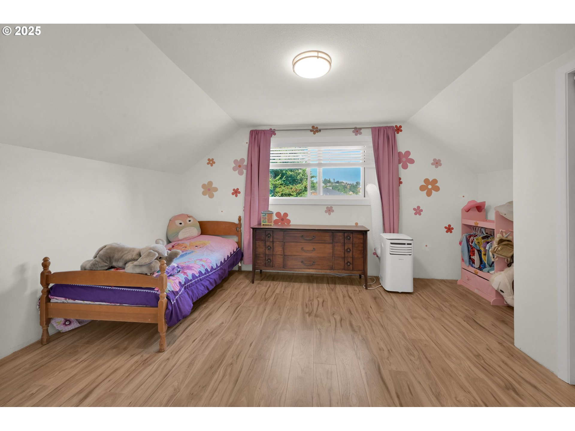 1275 Island Street Springfield, OR 97477 - Photo 36 of 36 a bedroom with furniture and a wooden floor