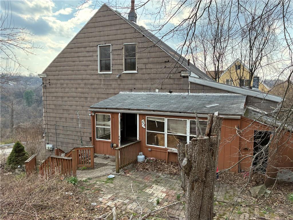2794 Mt Troy Road Pittsburgh, PA 15212 - Photo 8 of 8 a backyard of a house with seating space