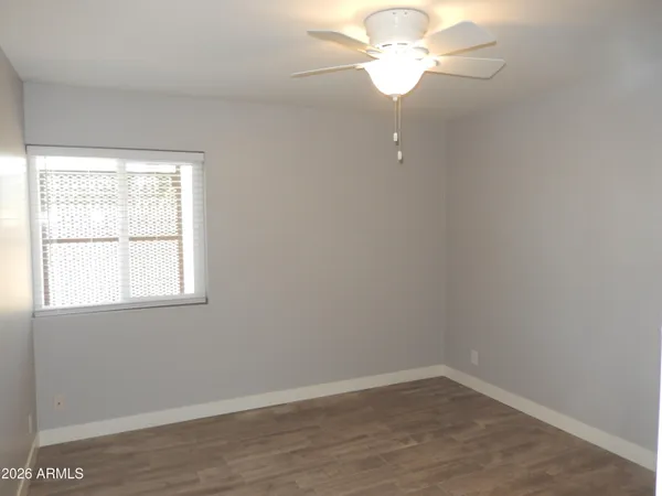 a view of a wooden fence