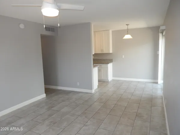 en empty room with a window