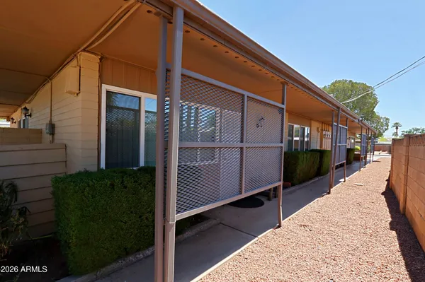 a view of a house with a street
