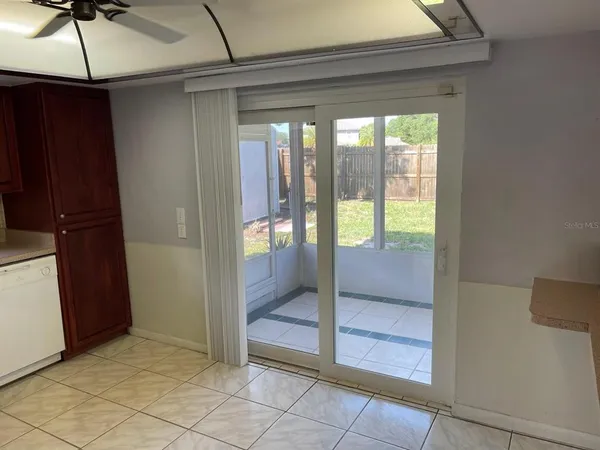 a view of an empty room and window