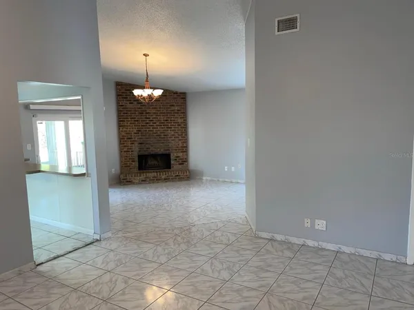 a view of a livingroom with a fireplace
