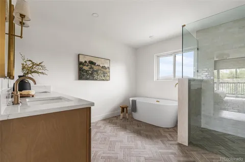 a bathroom with a sink toilet and tub