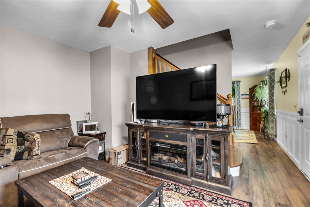 302 Middlefield Road Chester, MA 01011 - Photo 14 of 42 a living room with furniture and a flat screen tv