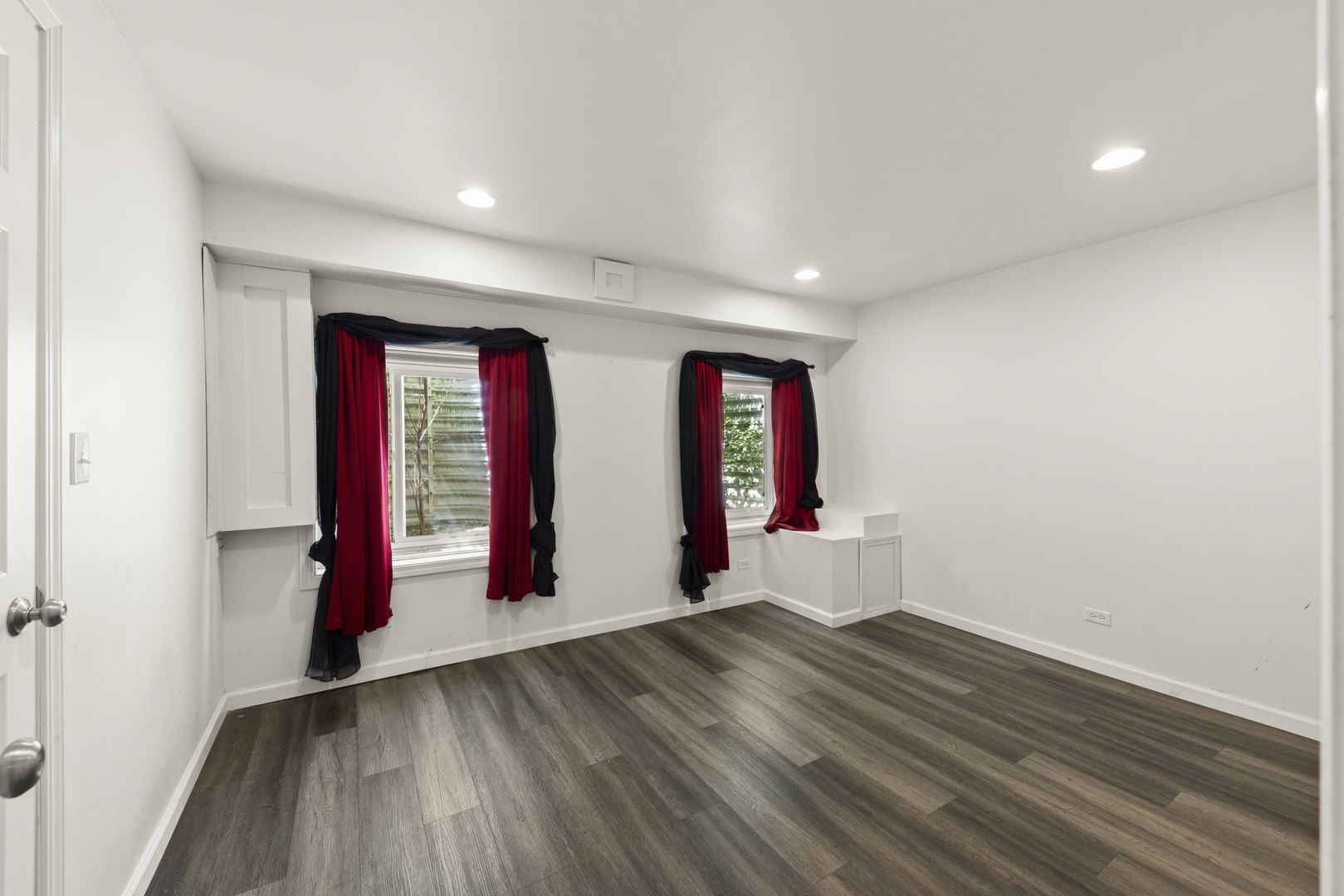 235 Garden Drive Elgin, IL 60124 - Photo 18 of 25 wooden floor in an empty room with a window