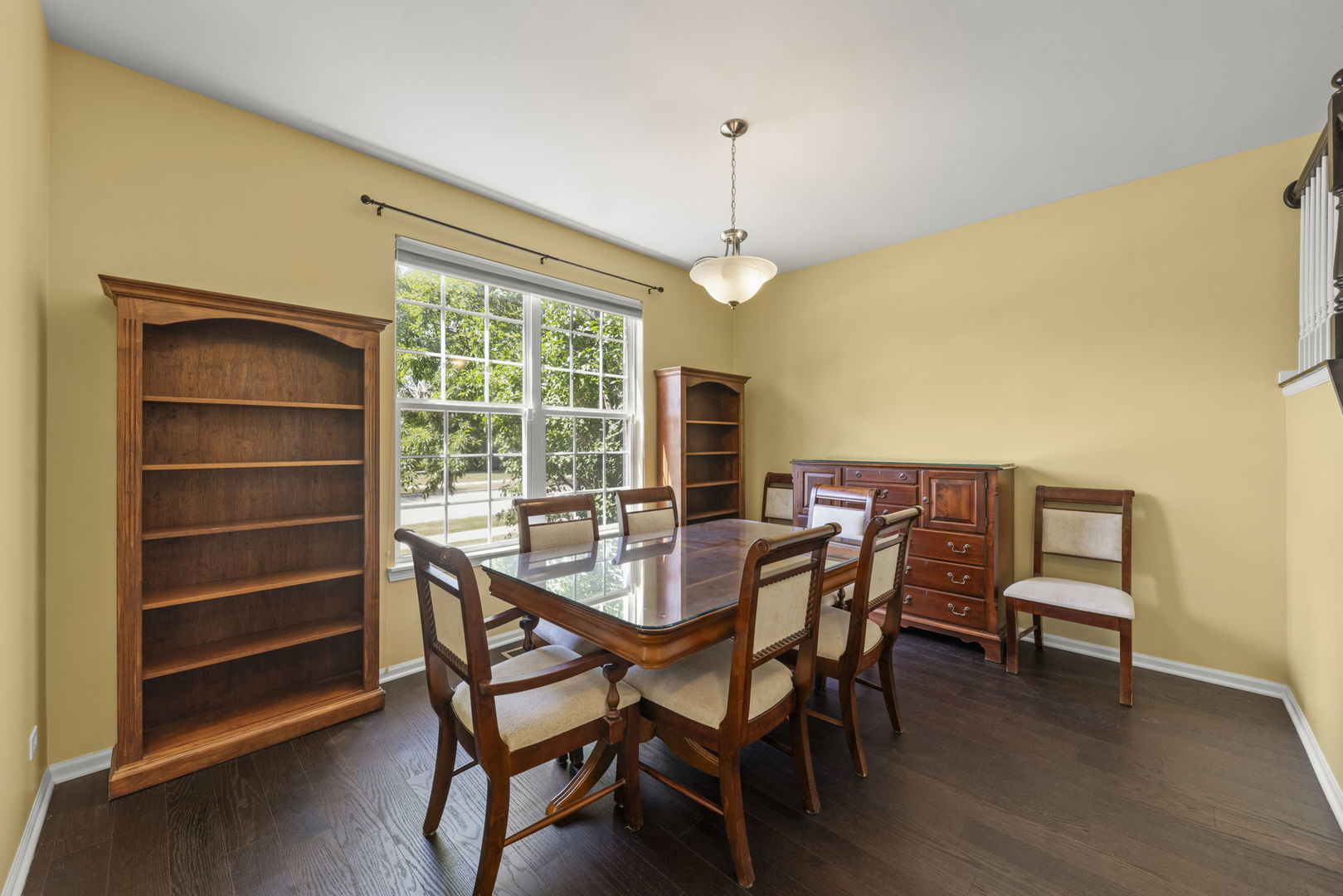 235 Garden Drive Elgin, IL 60124 - Photo 2 of 25 a view of a dining room with furniture window and wooden floor