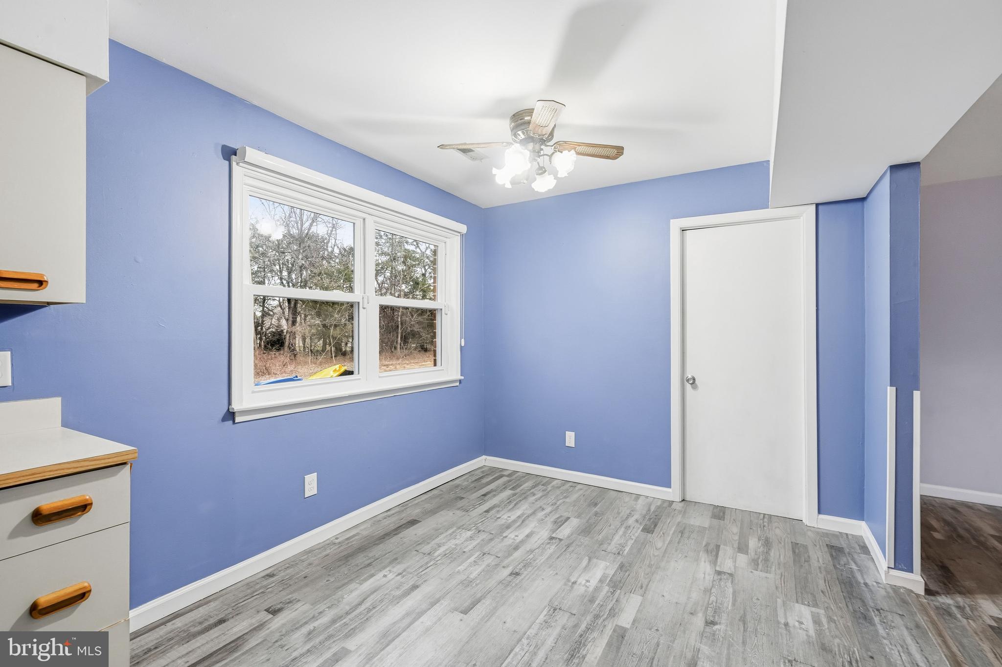 114 Eaves Mill Road Medford, NJ 08055 - Photo 13 of 20 wooden floor in an empty room with a window