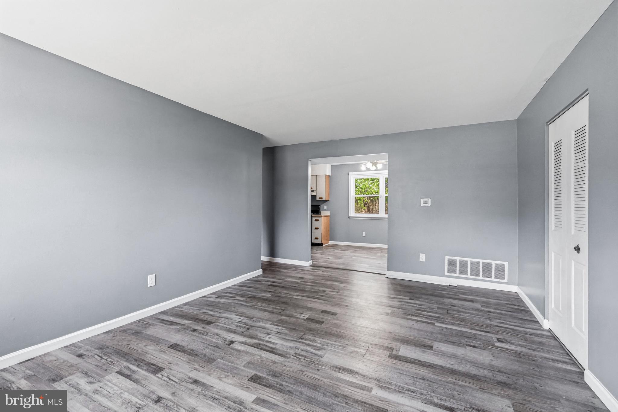 Living Room Open to Kitchen/Dining Area