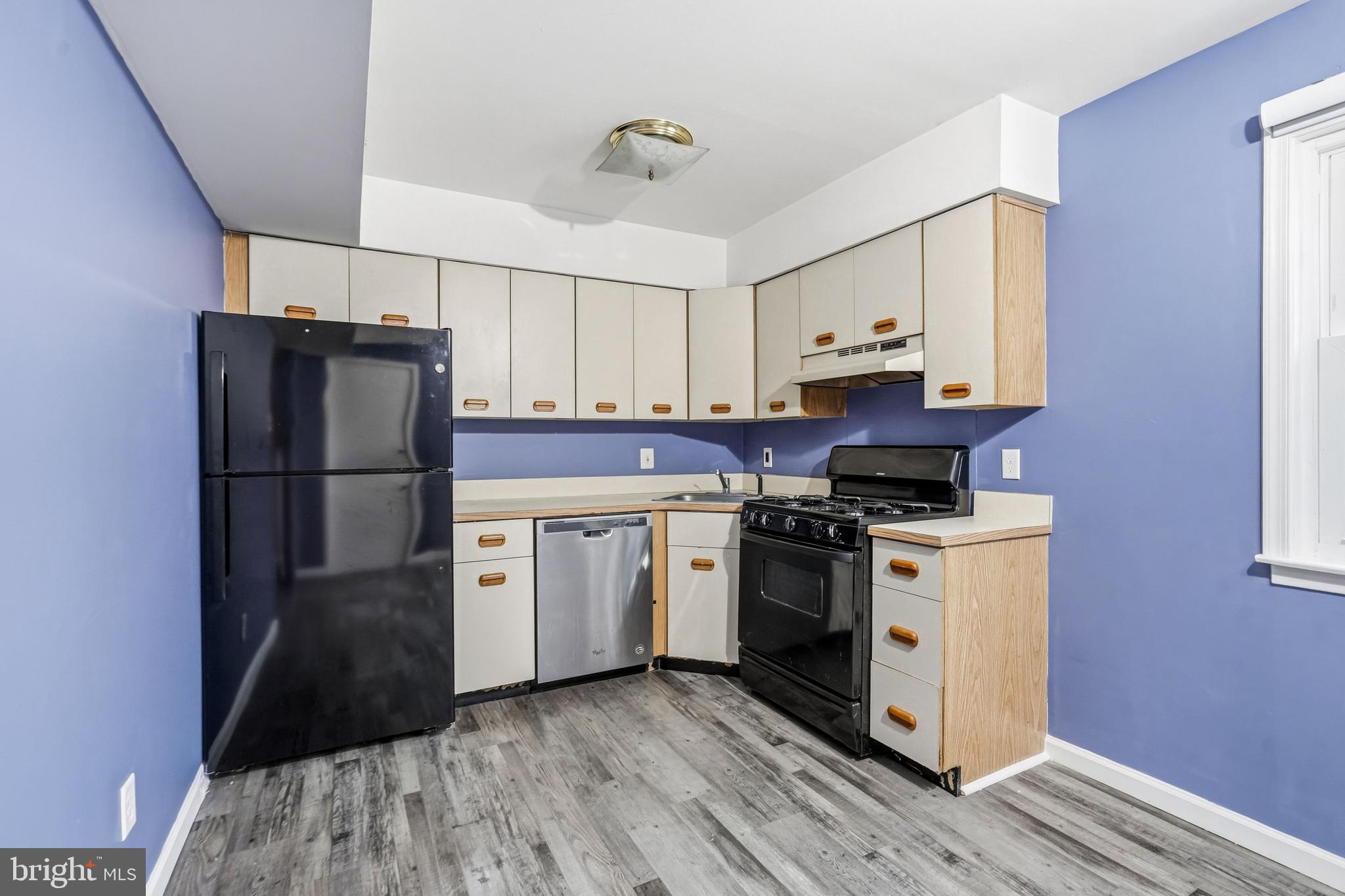 114 Eaves Mill Road Medford, NJ 08055 - Photo 8 of 20 a kitchen with stainless steel appliances a refrigerator sink and cabinets