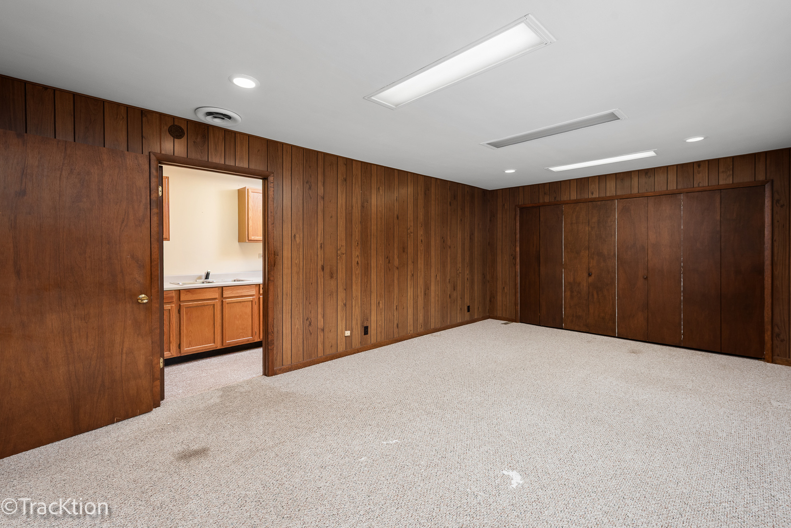 12S440 Lemont Road Lemont, IL 60439 - Photo 11 of 28 a view of an empty room with a kitchen