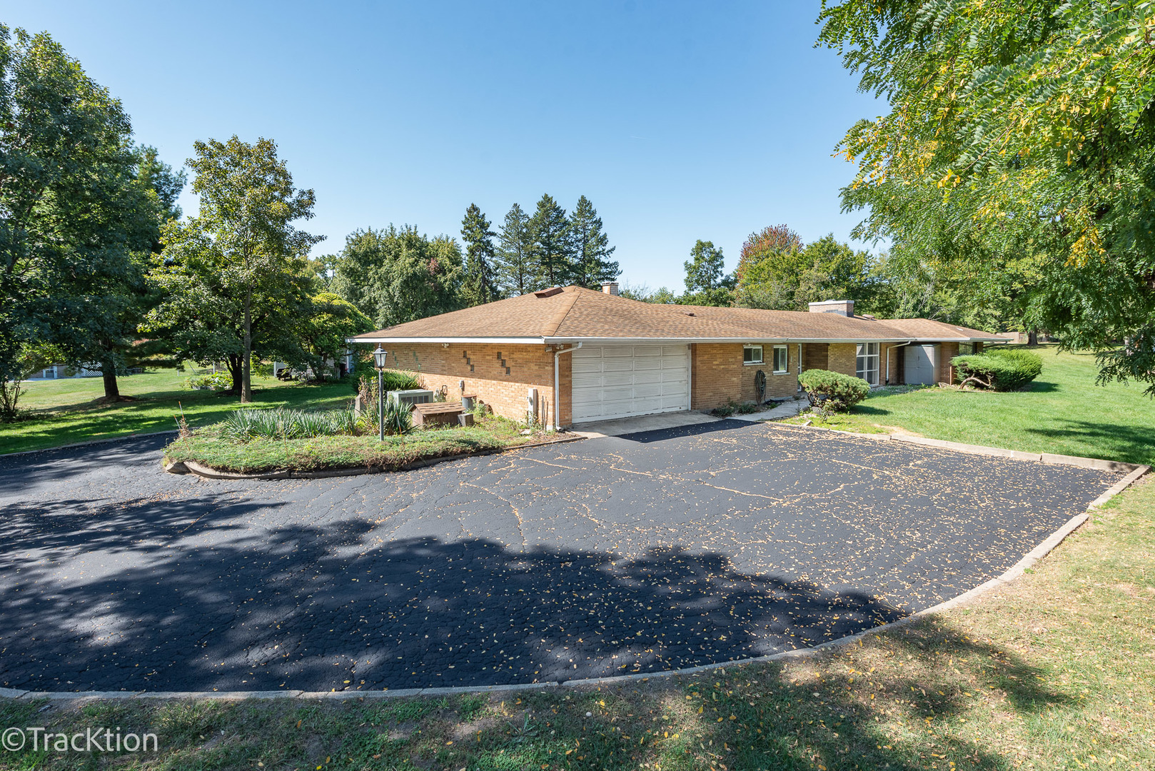 12S440 Lemont Road Lemont, IL 60439 - Photo 18 of 28 a front view of a house with a yard