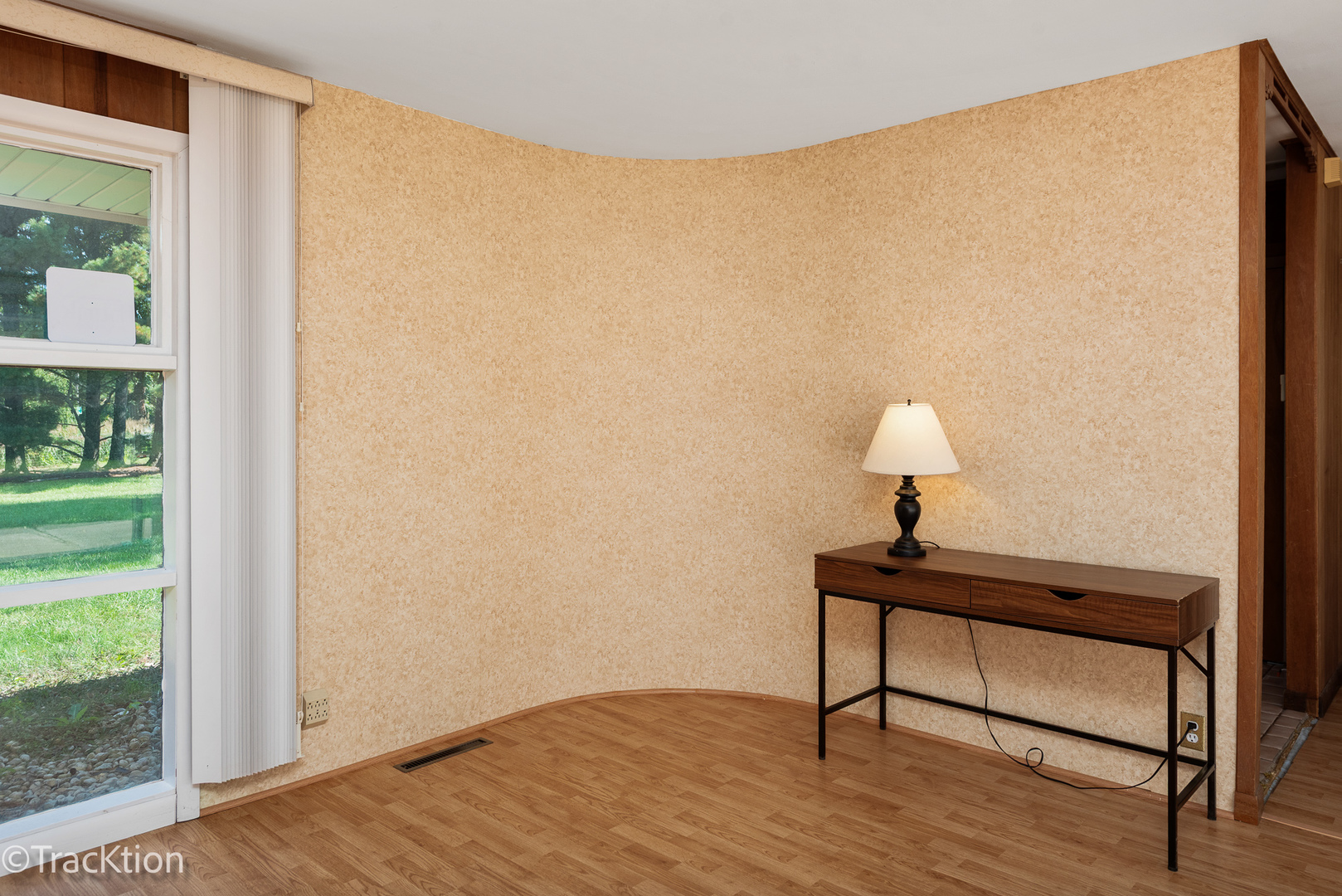 12S440 Lemont Road Lemont, IL 60439 - Photo 5 of 28 a room with a bench and a window