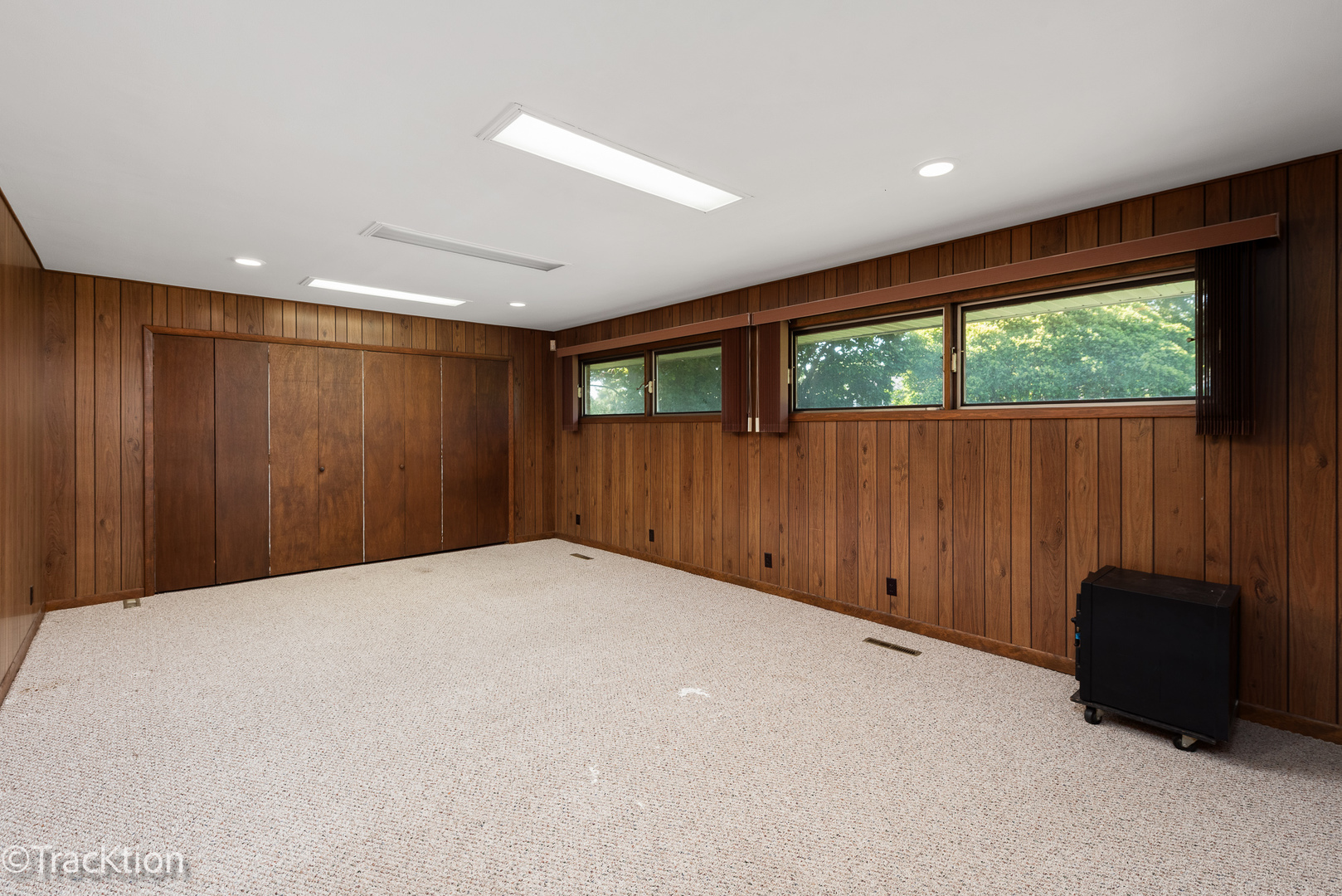 12S440 Lemont Road Lemont, IL 60439 - Photo 10 of 28 a view of an empty room with wooden floor and a window