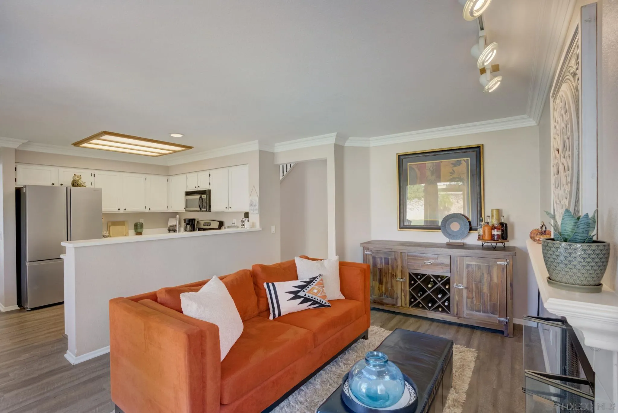 32012 Calle Espinosa Temecula, CA 92592 - Photo 18 of 53 a living room with furniture and a wooden floor