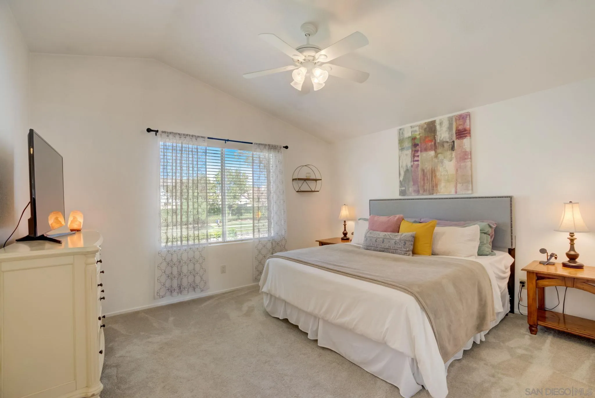 32012 Calle Espinosa Temecula, CA 92592 - Photo 20 of 53 a spacious bedroom with a bed and a chandelier